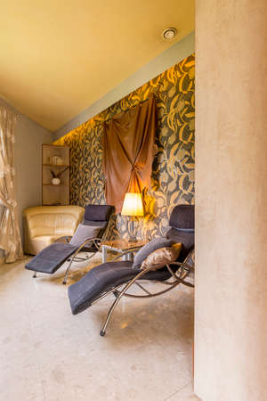 Shot of two chairs in a stylishly decorated roomの写真素材