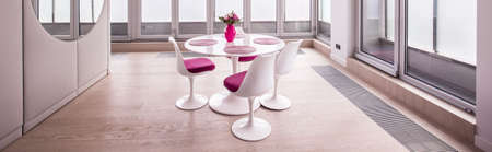 Bright dining room in exclusive panorama flatの写真素材