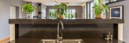 Cropped panoramic picture of a modern kitchenの写真素材