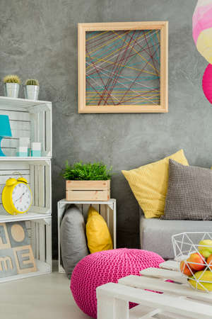 Photo of a modern flat in grey with DIY furniture and decorative wall finishの写真素材