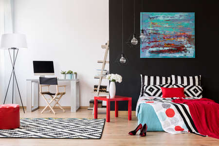 New design interior with large bed and small office areaの写真素材