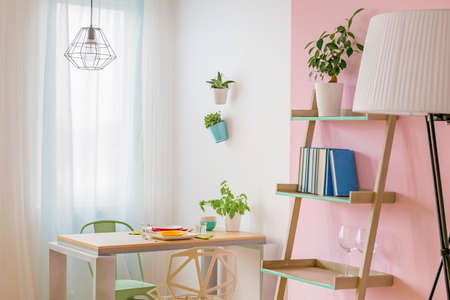 Light room with window, modern table, two chairs, regale and floor lamp