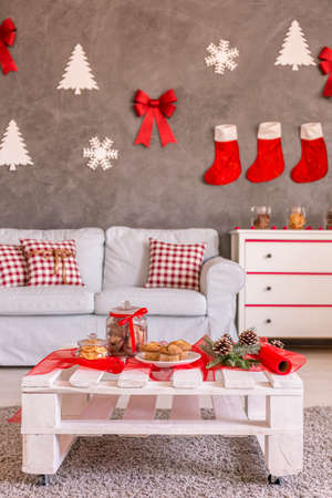 Modern apartment with red and white Christmas decorationsの写真素材