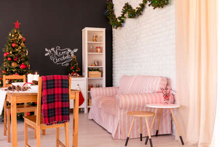 Traditional DIY Christmas decorations in modern flatの写真素材