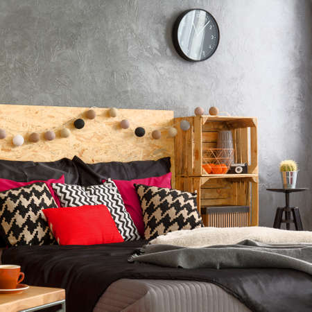 Big comfortable bed in new modern bedroom