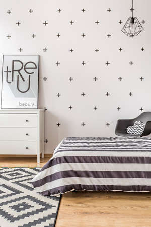 Cropped picture of a modern design of a black and white bedroomの写真素材