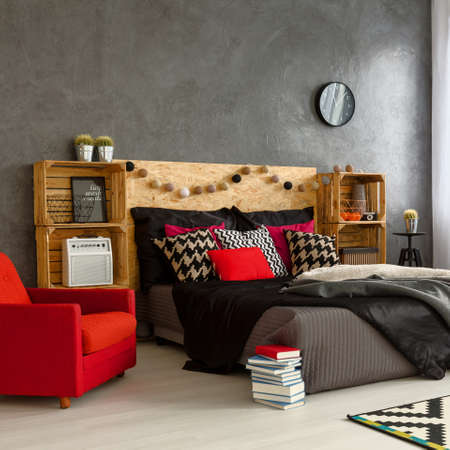 Modern bedroom with stylish bed  in contemporary apartmentの写真素材