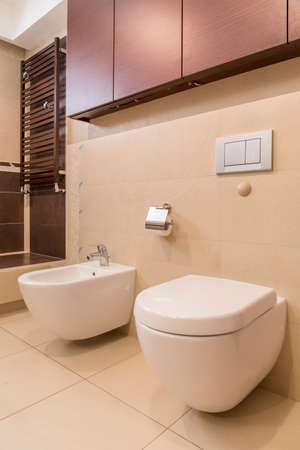 Close-up of beige tiles in luxury bathroom