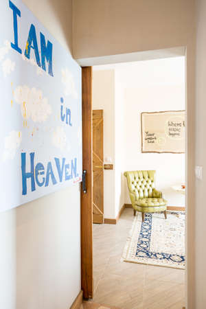 Hand-made painting on the wall in cosy home interior