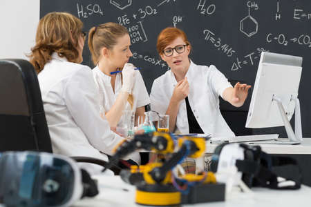 Shot of chemistry students and their teacher dedicated to scienceの写真素材