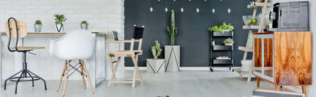 Black and white modern lounge in stylish loftの写真素材