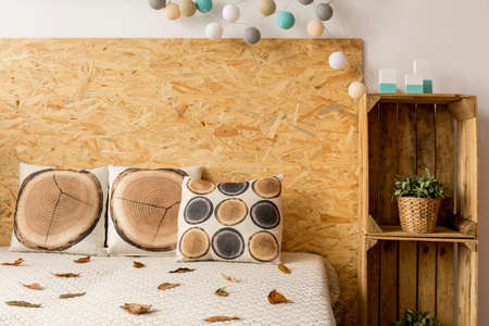 King-size bed and wooden boxes in a cozy bedroom