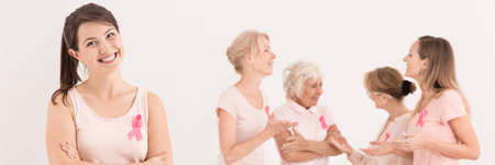 Dressed in pink women are lively talkingの写真素材