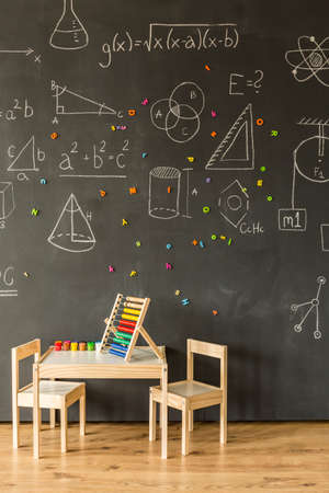 Classroom with blackboard and abacus for little childrenの写真素材