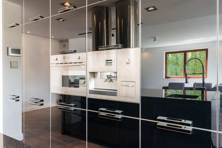 Closeup shot of a built-in equipment in a modern kitchen roomの写真素材