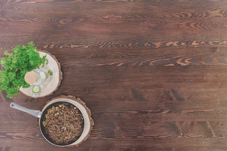 Whole grain pasta with sprouts lying on rustic tableの写真素材