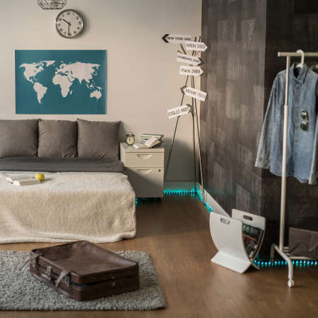 Spacious room with sleeping and study area.の写真素材