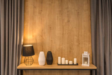 Stylish home decoration with lamp nad candlesの写真素材