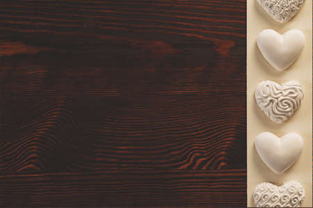 Wooden tabletop with stylish heart decorationの写真素材