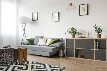 Bright living room interior with couch