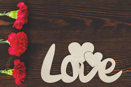 Love writing and cloves on the tableの写真素材