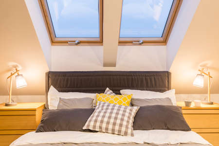 Stylish bedroom interior with marital bedの写真素材