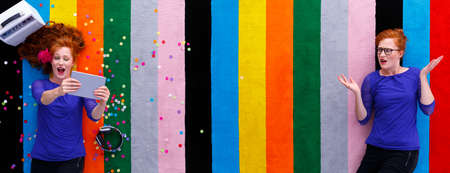 Lazy young woman and tired busy girl on a colorful backgroundの写真素材