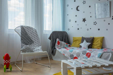 Quiet and bright area of boy astronaut room
