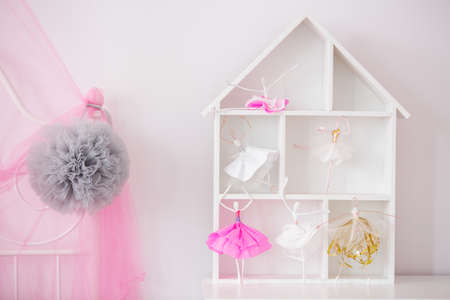 Wood house shelf for child room and pink canopyの写真素材