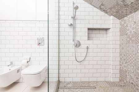 Tiles on the wall in luxury beige bathroomの写真素材