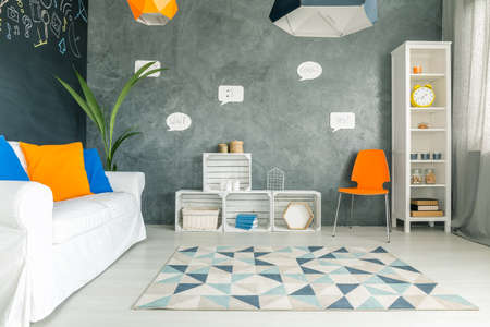 Cosy and comfortable room with bubbles painted on its wallsの写真素材