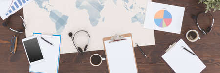 Workplace with clipboards and tablet in a company