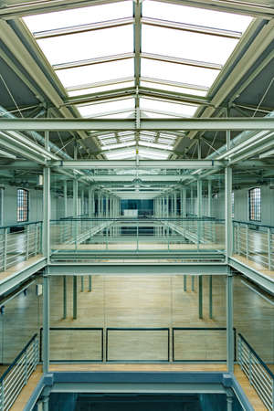 Spacious, industrial interior after revitalization with glass roof