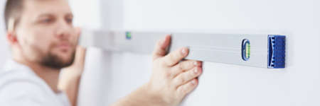 Close up of builder with level tool, panoramaの写真素材