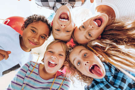 Group of children friends laughing and having funの写真素材