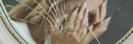 Fuzzy reflection of a broken mirrorの写真素材