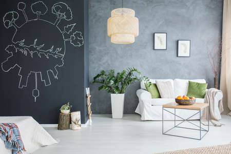Grey wall and white furniture in modern living roomの写真素材