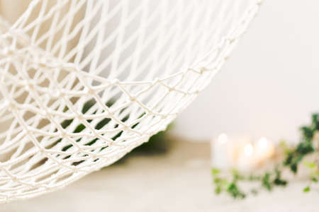 Close up of modern, white net hammockの写真素材