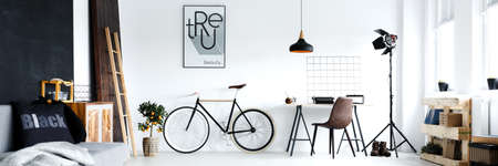 Panorama of minimalistic man's room with hipster work area
