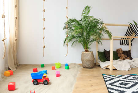 Natural safe child room in modern bohemian eco friendly styleの写真素材