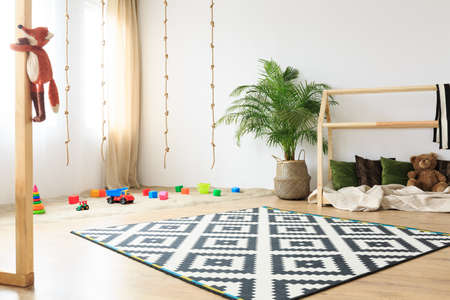 Soft cozy eco friendly fabric in neutral bright kids roomの写真素材