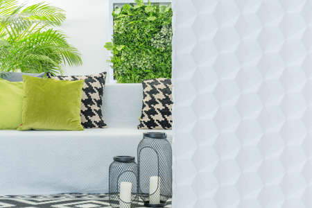 Four colourful pillows put on the couchの写真素材