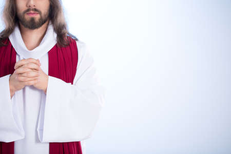 Lord with folded hands being calm in heavenの写真素材