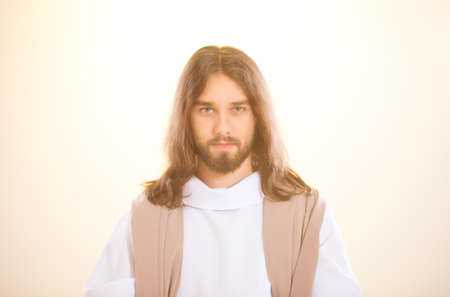 Jesus Christ standing in the light after resurrectionの写真素材