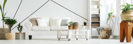 White wall with geometric pattern in a bright living room