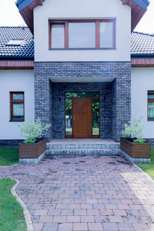 Elegant and modern main entrance to the detached houseの写真素材