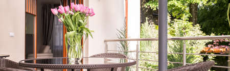 Close-up of tulips bouquet on the tableの写真素材