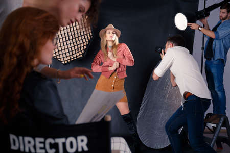 Fashion model posing durign professional photoshootの写真素材