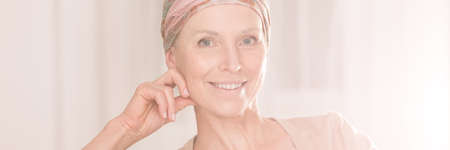 Portrait of smiled woman with shawlの写真素材