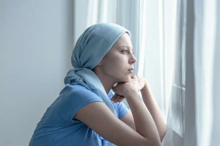 Woman with cancer after radiation therapy in hospitalの写真素材